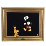 Mickey Mouse whistling with Pluto in a gold-tone framed Disney wall display with black background and Jie Junior logo.