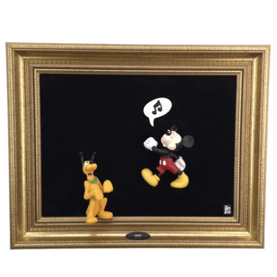 Mickey Mouse whistling with Pluto in a gold-tone framed Disney wall display with black background and Jie Junior logo.